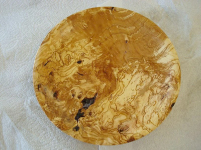 Here is a picture of some olive wood cut down in my neighborhood last 