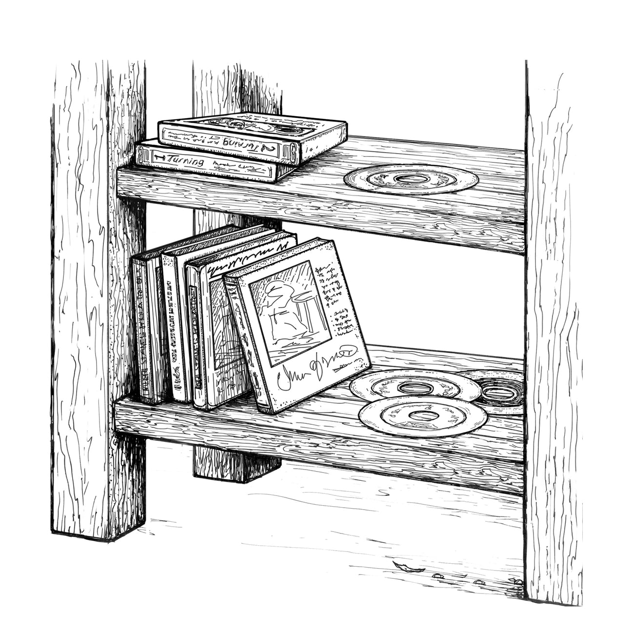 DVDs stacked on a wood shelf