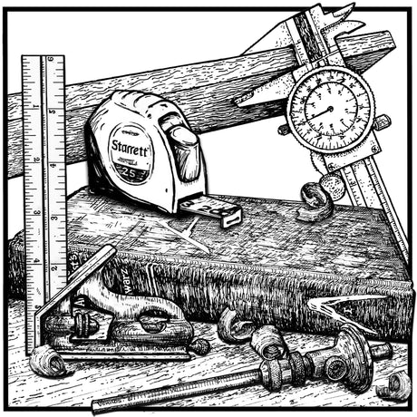 Assorted measuring tools with a book